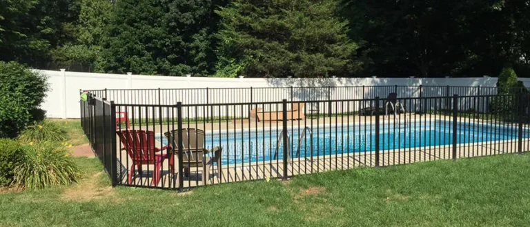 iron rod fence around pool