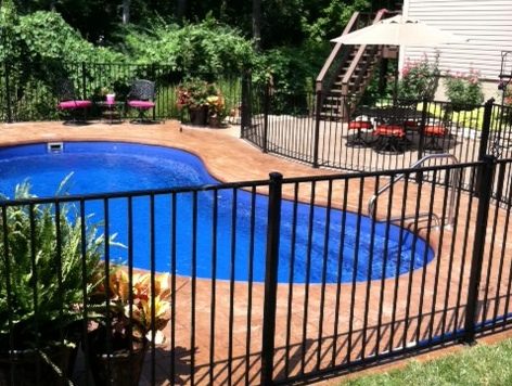 iron rod fence around pool